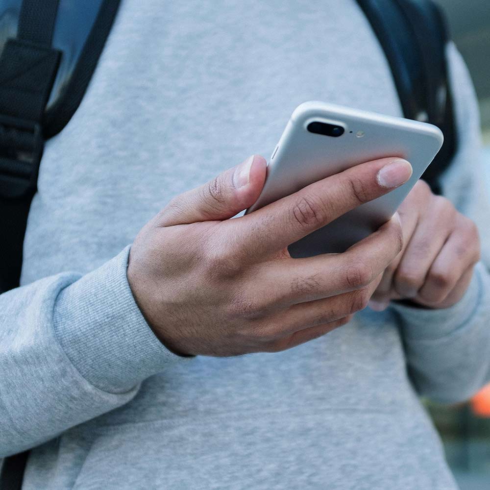 Student looking at cell phone